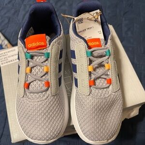 New toddler Adidas sneakers, size 10.